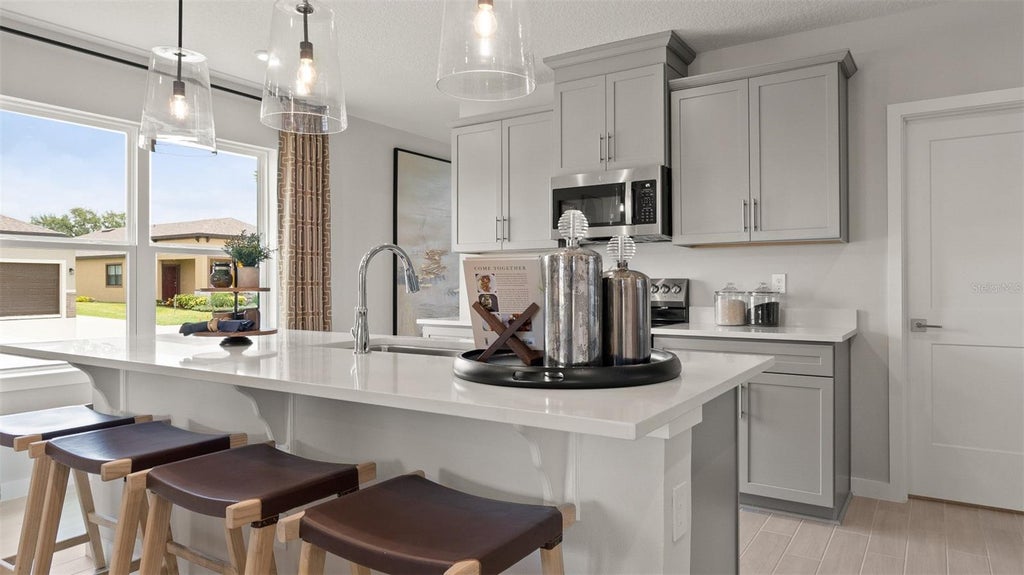 Photo of 746 Junonia Boulevard, New Smyrna Beach, FL 32168 (MLS # O6440393)