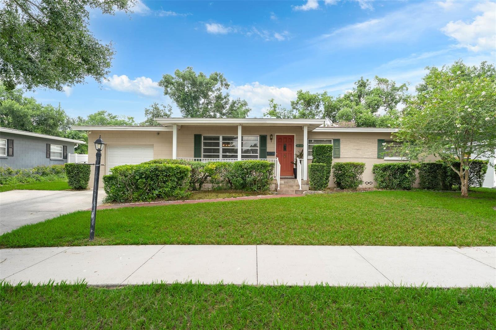 Mid-Century Charm Meets Modern Potential Near Downtown Orlando!
Welcome to 3019 Clemwood Street, a beautifully maintained 1958 mid-century home located just minutes from downtown Orlando in a highly sought-after school district—with no HOA fees!
This spacious home sits on almost a quarter acre and features three bedrooms, two bathrooms, and real hardwood floors throughout. One bathroom retains its classic mid-century character, while the other has been tastefully renovated.
In addition to the main living areas, there are two versatile bonus rooms—one currently used as a home office and the other as a formal dining room. The attached garage includes an interior laundry area and could easily be converted into additional living space. A screened-in back porch provides a perfect spot to relax or entertain.
But what truly sets this property apart is the detached garage, offering a prime opportunity to create an Accessory Dwelling Unit (ADU). The City of Orlando is actively encouraging the addition of ADUs, and with minimal investment—just add plumbing and HVAC—this space could become a guest house, rental unit, studio, or home office. With high demand for multi-functional properties, this is a rare find with serious income potential or multi-generational living possibilities.
Don’t miss your chance to own a property with both classic character and future flexibility in one of Orlando’s most central neighborhoods.