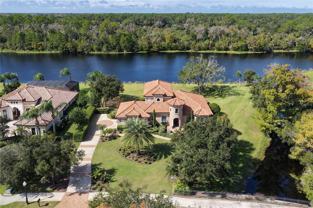 Photo of 202 Willow Oak Way, Palm Coast, FL 32137 (MLS # FC322402)