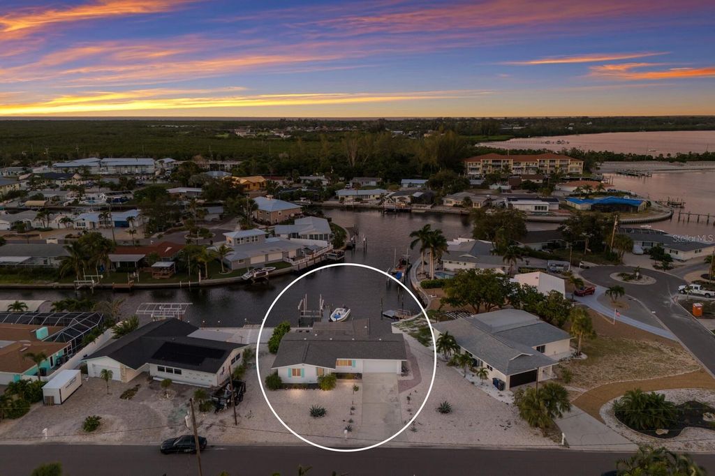 Photo of 10008 Spoonbill Road E, Bradenton, FL 34209 (MLS # A4666297)