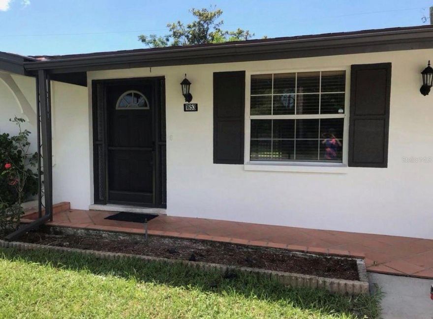 More photos to come...Cute two bedroom home on large lot with fenced yard. Nice curb appeal. Laminate in living room, hall and bedrooms, tile in kitchen, dining room and baths, Ceiling fans in bedrooms. Bathroom has tub/shower. Sliding doors to back yard, Large TIKI hut patio overlooking large fenced yard. 
Appliances belong to Tenant so they do not convey. New hurricane windows in 2024, New roof 2021, New exterior paint 2021, Septic tank pumped 2021.
TENANT OCCUPIED- PLEASE DO NOT DISTURB TENANT. Call listing agent to coordinate showing with tenant. 
Thank you for your consideration.