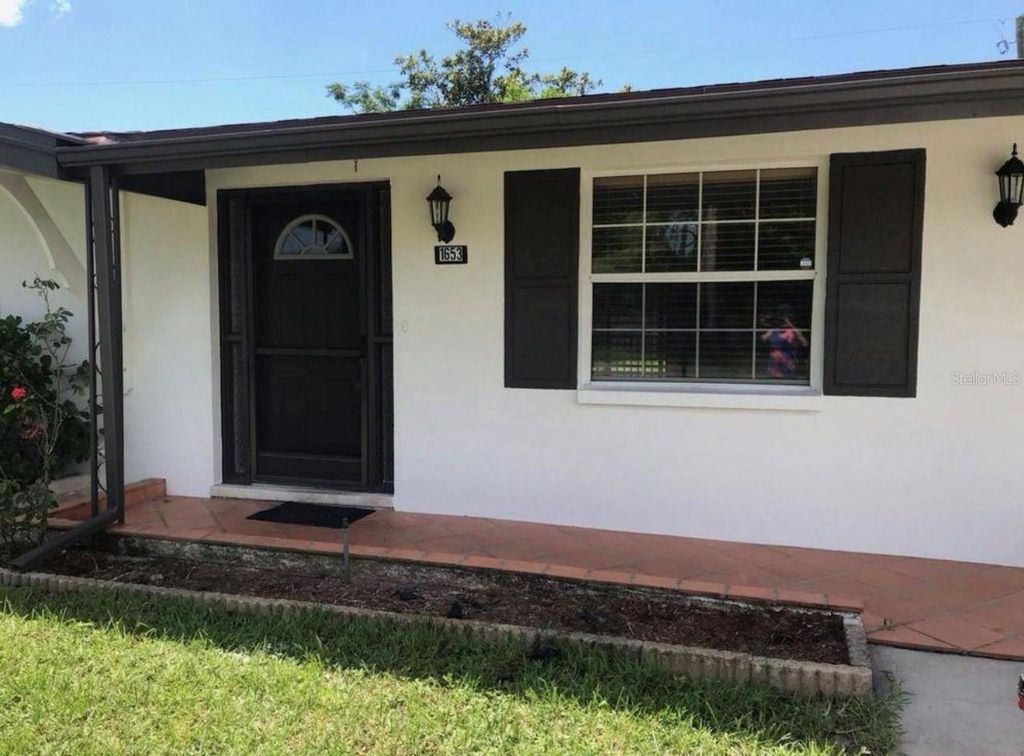 Photo of 1653 Debonair Drive, Holiday, FL 34690 (MLS # W7882253)