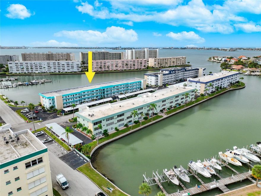 What a DEAL!   Awesome third floor 2 bedroom and 2 bath waterfront condo located in the Groton building of Town Shores.  Newer AC and freshly painted for easy move-in!   Town Shore amenities include 4 heated pools, tennis, pickleball, bocce, a grilling area, kayak/boat launch and shuffleboard.  An on-site management office is located in the 2 story Clubhouse along with organized activities including cards, billiards, game room, library, fitness room and his and hers sauna.  A security officer is on duty nightly.  The North and South Docks with kayak launch offer slips for rent and have been restored very recently. Copy and paste this link in your browser for more info on Town Shores https://www.townshorescommunity.com.  The Gulfport Art District is home to a variety of locally owned restaurants & bars, shopping, galleries, Public Library and Senior Center and the historic Gulfport Casino with its huge ballroom and dance floor.  Don’t miss the monthly First Friday Art Walk with live music plus a farmers market every Tuesday morning.  Town Shores is close to the revitalized downtown St Pete, major sport venues, International airports and last but not least – our Best Gulf Beaches.  Close to everything, yet a world away! Town Shores is one of the premier 55+ communities in Pinellas County.  Room sizes are approximate. All information is deemed to be accurate but is not warranted and should be verified.