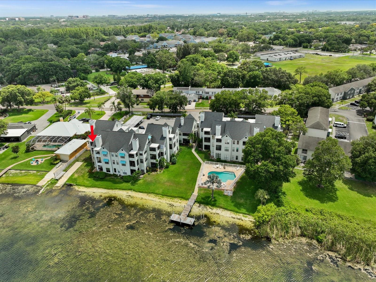 Welcome to your new home! This meticulously maintained condominium on Egypt Lake offers everything you need. With 3 bedrooms, 2 bathrooms, plus a bonus loft space, this corner unit provides plenty of room to spread out and make yourself comfortable. As you enter, you'll be greeted by an open concept living area, complete with a cozy fireplace that adds a touch of warmth and charm. The large loft space can easily be utilized as an office or artist oasis, providing flexibility for your needs. The kitchen is a true highlight, featuring granite countertops that perfectly complement the stainless steel appliances and rich dark wood cabinetry. Features ample storage space and has a lovely breakfast bar. All bedrooms in the unit are equipped with ceiling fans, ensuring optimal airflow and comfort. Step outside through the sliders to discover two spacious balconies where you can relax and enjoy the peaceful views of Egypt Lake and the surrounding mature trees. You'll never miss out on the natural light and the breathtaking sunrise that graces this wonderful space. Located in a 26-unit complex, this property offers both stairs and an elevator for easy access. Situated just north of Raymond James Stadium and Steinbrenner Field, and a short drive from Seminole Heights, you'll be conveniently close to a variety of amenities and entertainment options. The community itself features fantastic amenities including a dock, boat ramp, and a refreshing community pool. Whether you're a water sports enthusiast, a nature lover, or a boat owner, this place is truly a paradise for those seeking an active and enjoyable lifestyle. Don't miss out on this incredible opportunity to call this beautiful condominium your home. **First month, Last month, & Security Deposit Required(refundable). Non Smoking, Pets are allowed (2 max under 35lbs).**
