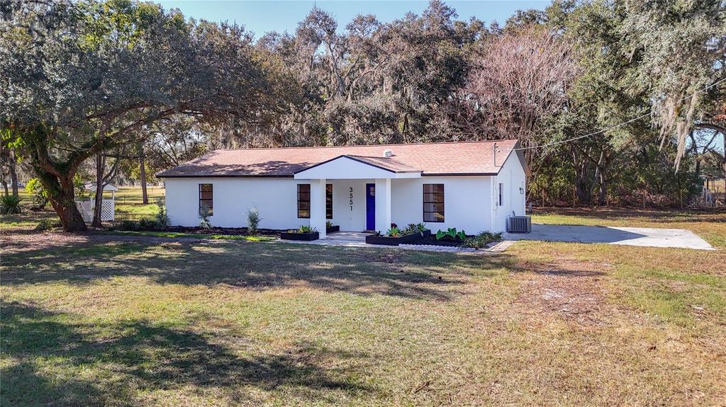 Photo of 3551 Oakwood Drive, Wesley Chapel, FL 33543 (MLS # TB8456330)