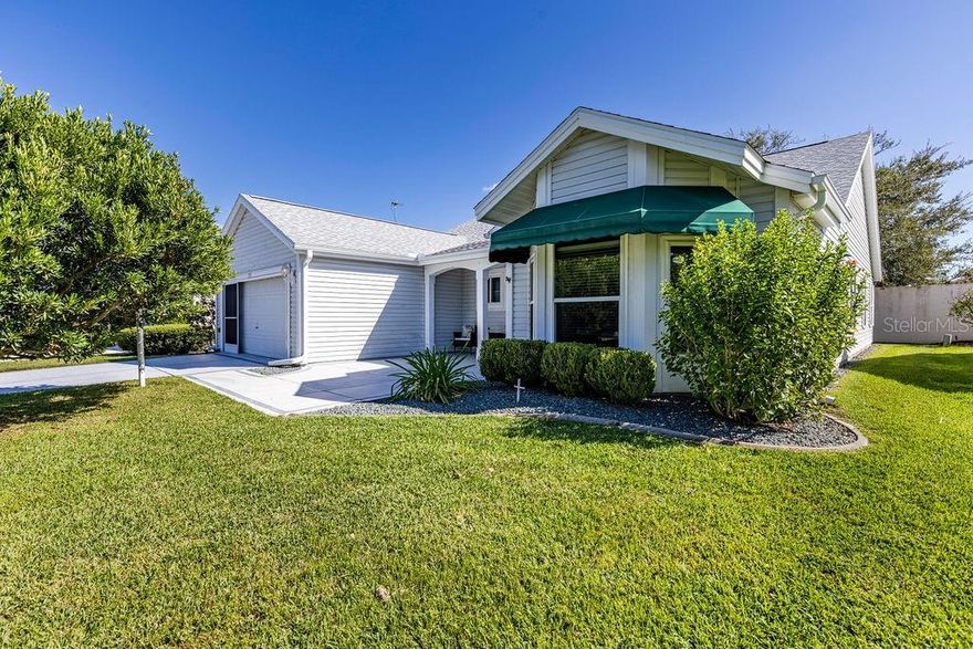 NO BOND! BACK ON THE MARKET & BETTER THAN EVER FOR SOME LUCKY BUYER! After a short break, this property returns and is ready to impress. Welcome Home to this beautifully maintained 3-bedroom, 2-bath Vera Cruz Designer Home, offering comfort, style, and an unbeatable location in the heart of The Villages®. From the moment you arrive, the painted driveway, expanded entryway, and charming curb appeal set the tone for what’s inside. Step through the front door and into a light-filled open floor plan highlighted by new luxury vinyl plank flooring, upgraded lighting, and modern ceiling fans that bring a fresh, updated feel throughout the home.

The spacious kitchen is designed with the home chef in mind—featuring generous counter space, plenty of cabinetry, and a sunny breakfast nook perfect for morning coffee or casual meals. The adjacent living and dining areas provide an inviting space for both relaxing and entertaining. The primary suite offers a private retreat with dual walk-in closets and an en-suite bath featuring double sinks, an oversized vanity, a step-in shower, and a linen closet. Guests will enjoy their own separate wing, complete with two comfortable bedrooms and an updated guest bath with a tiled step-in shower.

Enjoy the best of Florida living in the enclosed lanai, enhanced with large sliding windows—ideal for an office, craft space, or cozy TV room. Step outside to the back patio for fresh air and outdoor enjoyment. This home has been lovingly cared for with thoughtful updates including luxury vinyl plank flooring in 2020, a new hot water heater in 2019, a roof replacement in 2024, soffit and fascia replacement in 2024, and HVAC service completed in October 2025.

Centrally located just minutes from Spanish Springs Town Square and Lake Sumter Landing Market Square, you’ll have easy access to nightly entertainment, shopping, dining, and recreation—plus championship and executive golf courses are right nearby.

This exceptional home is move-in ready, with NO BOND and all the right updates already done. Don’t miss your opportunity to start living the lifestyle you’ve been dreaming of in The Villages!