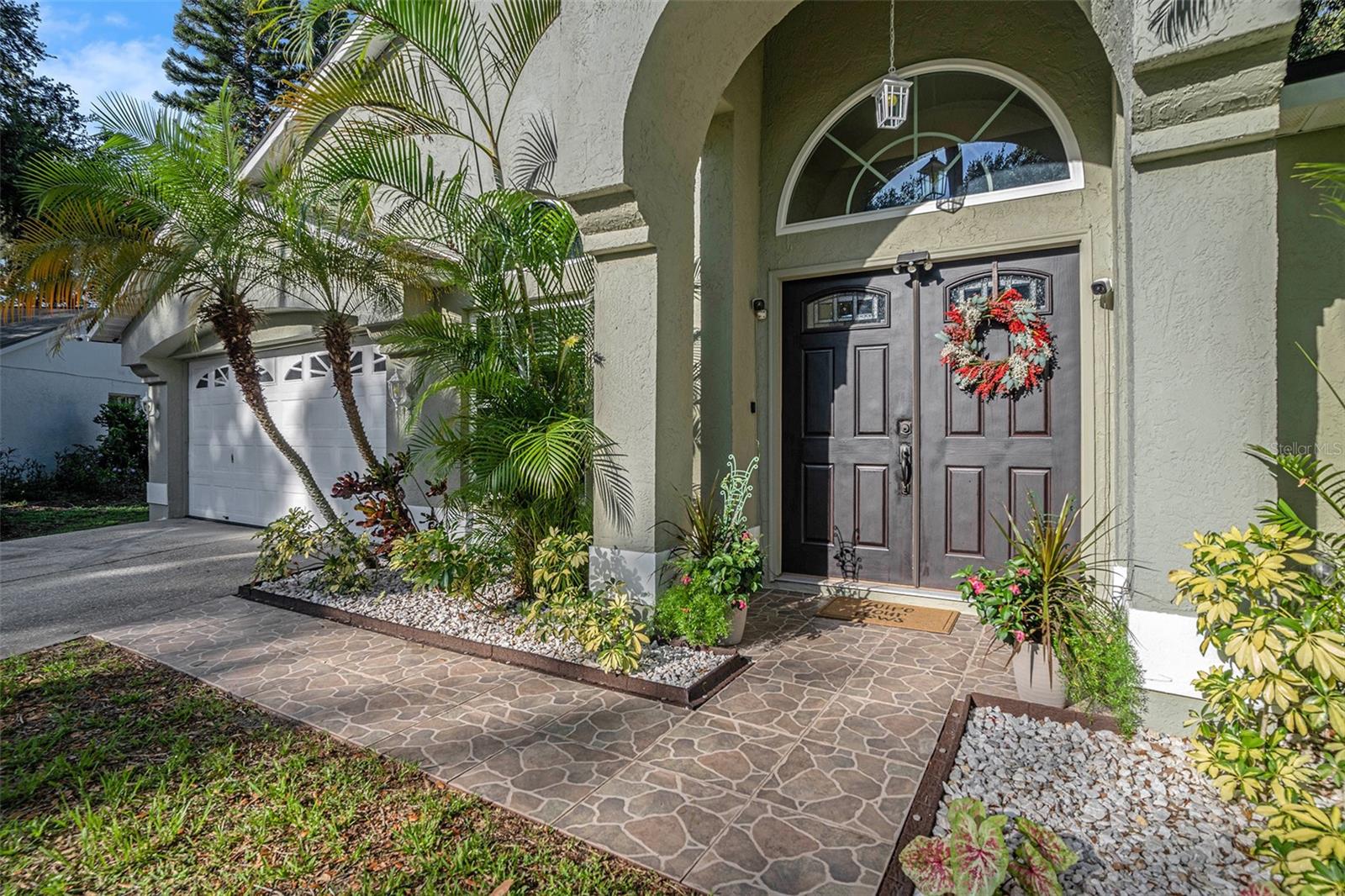 Welcome to this beautifully updated and well-maintained 3-bedroom, 2-bathroom home located on a quiet cul-de-sac
in the desirable community of Valrico. Offering 2,063 square feet of thoughtfully designed living space, this residence
combines modern upgrades with comfort and functionality.
Enjoy spacious, open-concept living and dining areas featuring vaulted ceilings and abundant natural light. The modern
kitchen is equipped with sleek granite countertops and black stainless steel appliances. Luxury vinyl plank in the main
living area, carpeted bedrooms and tiled bathrooms. A split-bedroom floor plan provides privacy, while the primary suite
includes a walk-in closet and a generously-sized ensuite bathroom.
Step outside to a screened-in, ceramic tiled lanai, perfect for outdoor dining and relaxation. The home sits on a sprawling
3.3-acre lot, including beautiful conservation and lake front views. The property line extending past the tree line and
across the lake channel, offering serene views, privacy and ample space to enjoy the daily showcase of abundant wildlife
Additional features include a vinyl privacy fence, a newer, upgraded GAF roof and a powerful, 5.0 ton SEER2 A/C system,
dual-pane, argon gas, hurricane-rated windows with faux wood blinds, ensuring an energy-efficient home. An attached 2-
car garage with built-in bench and storage shelving, and a low annual HOA fee of $150 makes this home even more
appealing.
Located in a quiet, yet prime area with easy access to major highways, shopping, dining, and top-rated schools, this
move-in-ready home offers the perfect blend of style, space, and location.