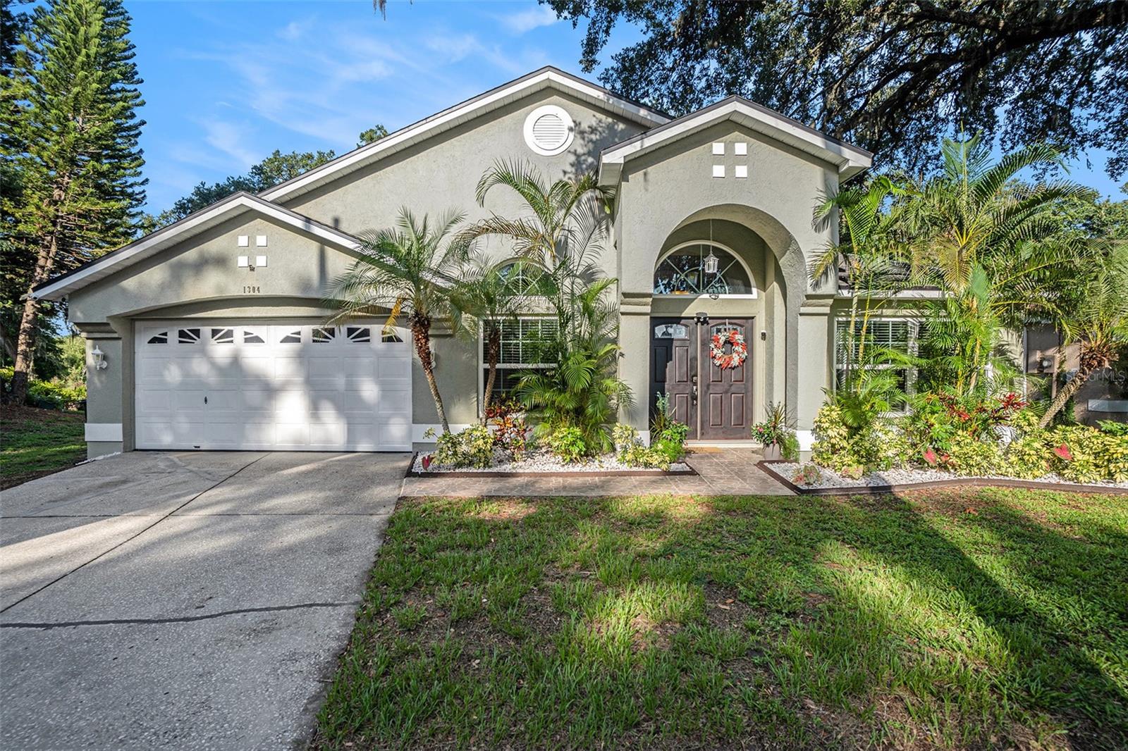Welcome to this beautifully updated and well-maintained 3-bedroom, 2-bathroom home located on a quiet cul-de-sac
in the desirable community of Valrico. Offering 2,063 square feet of thoughtfully designed living space, this residence
combines modern upgrades with comfort and functionality.
Enjoy spacious, open-concept living and dining areas featuring vaulted ceilings and abundant natural light. The modern
kitchen is equipped with sleek granite countertops and black stainless steel appliances. Luxury vinyl plank in the main
living area, carpeted bedrooms and tiled bathrooms. A split-bedroom floor plan provides privacy, while the primary suite
includes a walk-in closet and a generously-sized ensuite bathroom.
Step outside to a screened-in, ceramic tiled lanai, perfect for outdoor dining and relaxation. The home sits on a sprawling
3.3-acre lot, including beautiful conservation and lake front views. The property line extending past the tree line and
across the lake channel, offering serene views, privacy and ample space to enjoy the daily showcase of abundant wildlife
Additional features include a vinyl privacy fence, a newer, upgraded GAF roof and a powerful, 5.0 ton SEER2 A/C system,
dual-pane, argon gas, hurricane-rated windows with faux wood blinds, ensuring an energy-efficient home. An attached 2-
car garage with built-in bench and storage shelving, and a low annual HOA fee of $150 makes this home even more
appealing.
Located in a quiet, yet prime area with easy access to major highways, shopping, dining, and top-rated schools, this
move-in-ready home offers the perfect blend of style, space, and location.