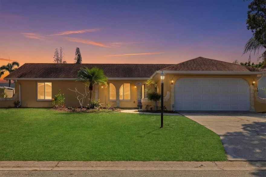 One or more photo(s) has been virtually staged. Experience the ultimate Florida lifestyle in this stunning 3-bedroom, 2-bath gem located in the highly sought-after Spanish Park community! With no HOA or CDD fees, this home offers the freedom and flexibility you desire. Enjoy the perfect blend of comfort and convenience with nearby access to the Manatee River and the beautiful Gulf Coast, plus proximity to Blake Memorial Hospital. Step inside to discover a thoughtfully designed layout featuring a spacious living/dining room combination, an inviting kitchen with an alluring breakfast nook, and a cozy den area. This home is packed with luxurious upgrades, including Hickory Wooden Kitchen Cabinets and top-of-the-line LG appliances: stove, refrigerator, dishwasher, and microwave. Elegant Travertine Stone Flooring in the main living areas and plush carpeting in the bedrooms. Stunning bathrooms with exquisite tile work and gorgeous vanities, plus a relaxing tub with a handheld shower in the primary bath. Additional highlights include a recently installed split A/C system in the garage, a new impact-rated insulated garage door, and all IMPACT windows/doors designed to withstand the elements. Enjoy peace of mind with a new A/C unit, whole house gutters, and a new electrical panel with enhanced outlets inside and out. The fenced backyard features dual access gates and an 8’ x 10’ Tuff Shed storage unit rated for 160 mph winds, providing ample outdoor storage. Inside, you'll find wood panel and pocket doors that maximize privacy, along with beautiful plantation shutters and accordion blinds throughout. Washer and Dryer located in the garage. Don’t miss your chance to own this one-of-a-kind home in a prime location, just off 59th Street and Manatee Avenue West. With convenient access to shopping, dining, and parks, this is the perfect place to call home. Some photos have been virtually staged. Schedule your showing today—this exceptional opportunity won’t last long!