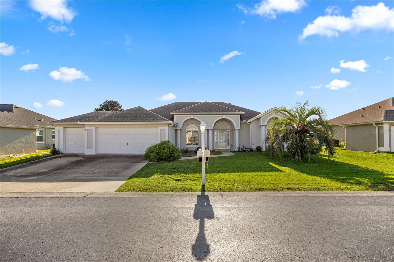 Welcome to Ocala Palms, a premier 55+ golf course community! his beautifully maintained home is perfectly positioned on the 17th hole, offering serene views of the lush greens right from your backyard. Designed with comfort and convenience in mind, the open floor plan and split-bedroom layout create a seamless flow for both everyday living and entertaining. Inside, you’ll find newer flooring throughout, a spacious kitchen with a center island, and a bright, inviting living area. The primary suite features a walk-in shower and an oversized soaking tub, offering the perfect retreat at the end of the day. Step outside to the enclosed lanai, complete with a summer kitchen, where you can relax, dine, or entertain while enjoying the peaceful golf course backdrop.Located just 3.6 miles from the World Equestrian Center, this property is ideal for horse enthusiasts or anyone looking for a vibrant lifestyle in a prime Ocala location. This home combines the best of resort-style living, a great floor plan, and unbeatable location—all within one of Ocala’s most desirable 55+ communities.