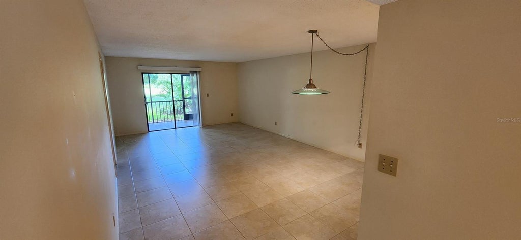 Photo of 3505 Tarpon Woods Boulevard #H405, Palm Harbor, FL 34685 (MLS # TB8561313)