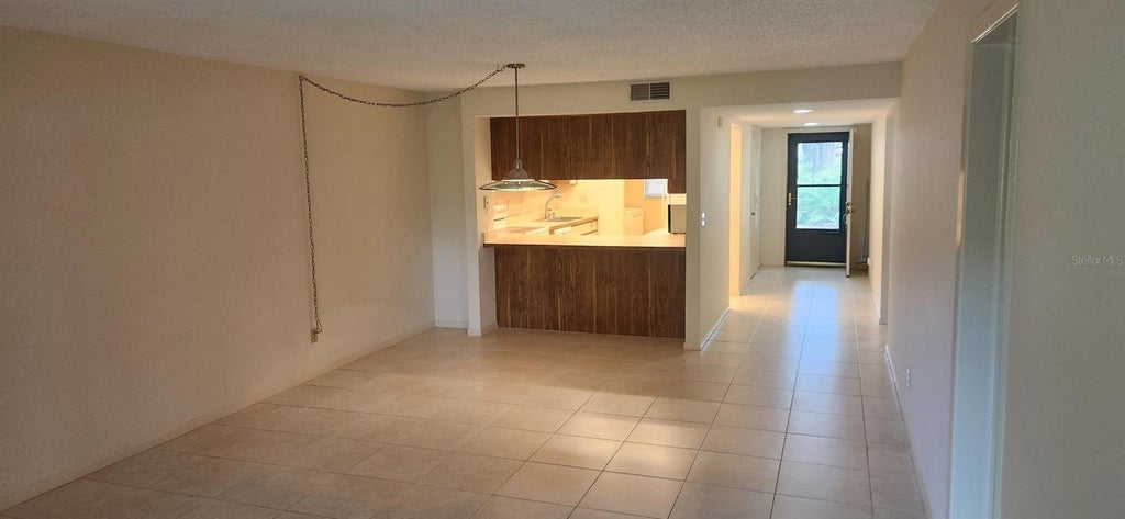 Photo of 3505 Tarpon Woods Boulevard #H405, Palm Harbor, FL 34685 (MLS # TB8561313)