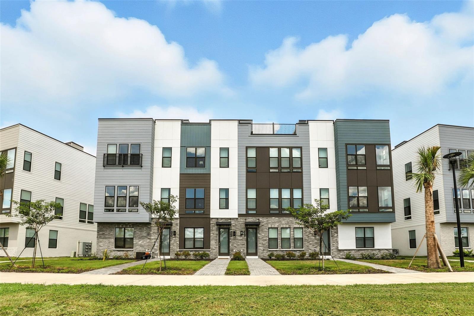 Come view this newly built 3-storey townhome with rooftop terrace in the vibrant Packing District! This luxurious 3 bed/2.5 bath corner unit is situated within minutes of top-rated schools, restaurants, and shopping. Easy access to main highways (I-4, 408, SR50), and the Turnpike, and just minutes away from Downtown Orlando and Winter Park. On the first floor, you’ll find a guest bedroom with an en-suite bath and access to the 2-car garage, complete with a storage closet and electric vehicle outlet. The second floor serves as the main living area, showcasing a gourmet kitchen with wraparound counter space and a sprawling center island, equipped with natural gas appliances. The great room features large windows with serene water views and plenty of natural light, complemented by a powder room. On the third floor you will find the master bedroom with a WIC, a spacious secondary bedroom with a private bath, and a laundry room. Make your way up to the expansive rooftop terrace, finished with stub-outs for a future outdoor kitchen, fireplace, and jacuzzi! The Brix community, located in The Packing District, offers a short distance to amenities like the YMCA, Orlando Tennis Center, the Amphitheatre, and a 1.5-mile walking/biking trail. Available now. $95 non-refundable application fee per applicant. Sorry, no pets. Qualifications: Income 3X rent, credit score of 700 plus, and background checks. Equal Opportunity Housing.