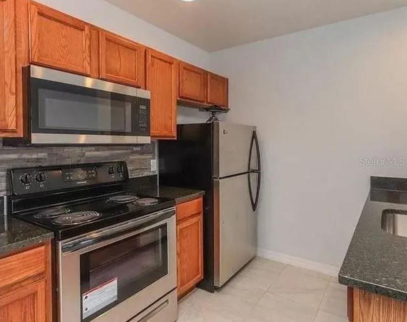 Photo of 2611 Gala Road N #105, Kissimmee, FL 34746 (MLS # S5158267)