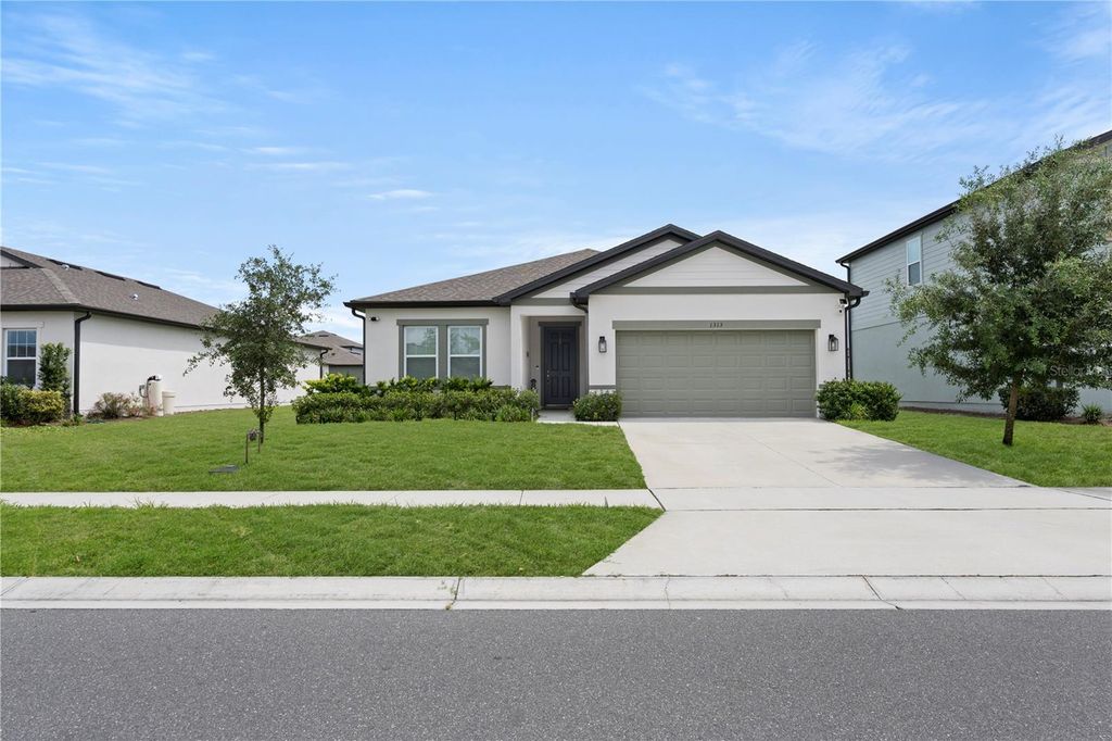 Photo of 1313 Sterling Pointe Drive, Deltona, FL 32725 (MLS # O6390790)