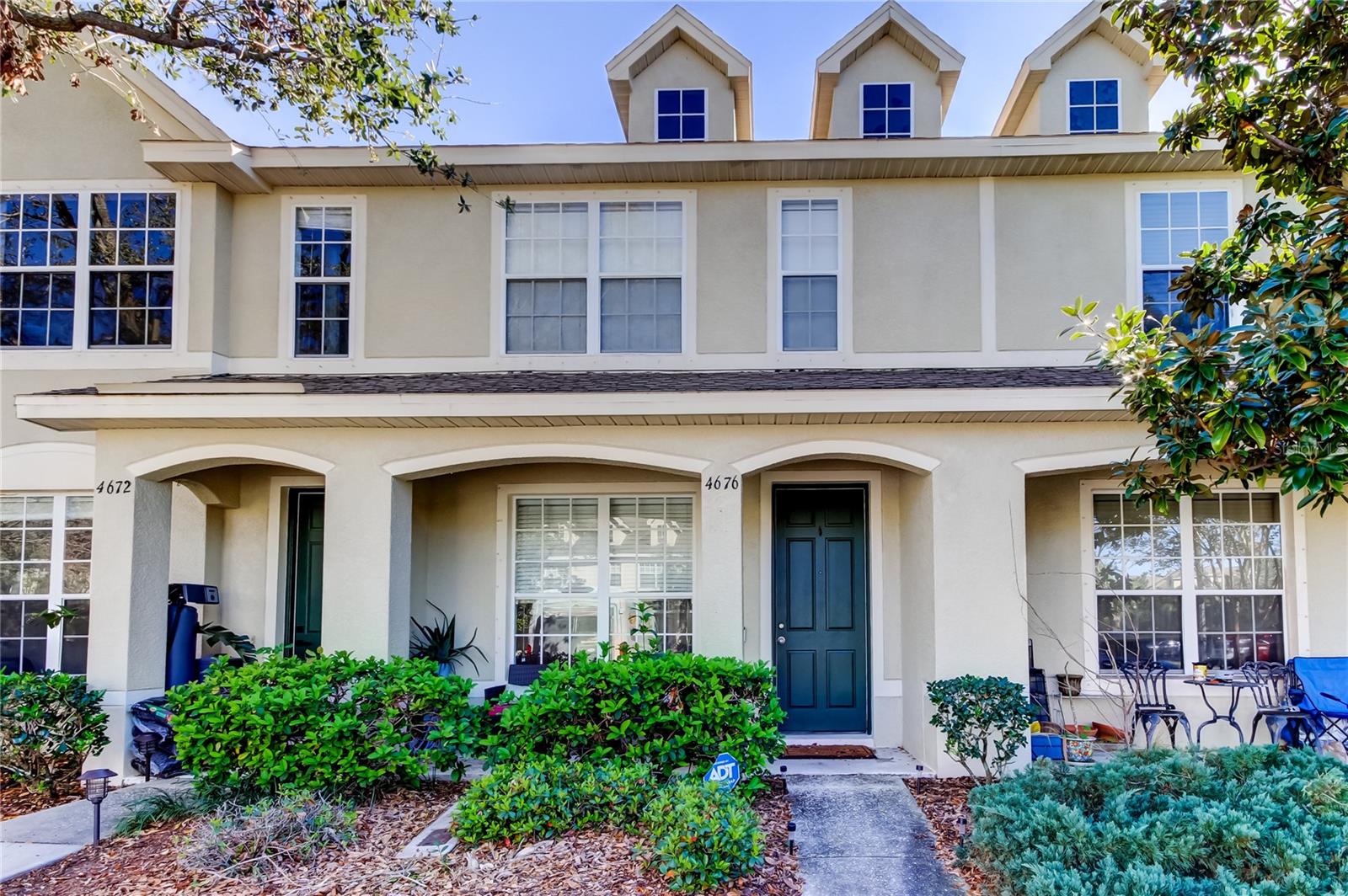 Welcome home to Sawgrass Village. This impressive two bedroom, two and a half bathroom townhouse features an open floor plan, vaulted ceilings on the second floor with two bedrooms with en suite bathrooms and walk in closets. New roof and fresh exterior paint just completed! Enter through the covered front porch to a lovely open concept living room, dining room and kitchen layout. The half bathroom is conveniently situated on the first level. The kitchen features dark hardwood cabinetry and matching appliances. The laundry closet is easily accessible on the second floor. Step out the sliding back doors to an open patio overlooking the semi private back yard, a great spot for the grill. Sawgrass Village is a fantastic community and features low HOA fees, a beautiful community pool, clubhouse, dog park and a reasonable rental policy. Each home is assigned one private parking space and there are multiple available guest spots throughout. Sawgrass Village is in Flood Zone X and sustained no flooding or damage from the recent storms. Pinellas Park is a very convenient & desirable community that is close to the interstate, top rated Tampa Bay restaurants and the #1 rated Clearwater Beach! Only twenty minutes to Tampa International Airport and fifteen minutes to St. Pete/Clearwater Airport. There are several incredible county & state parks nearby, wonderful shopping and some of the best dining in Tampa Bay. Call for your private showing today.