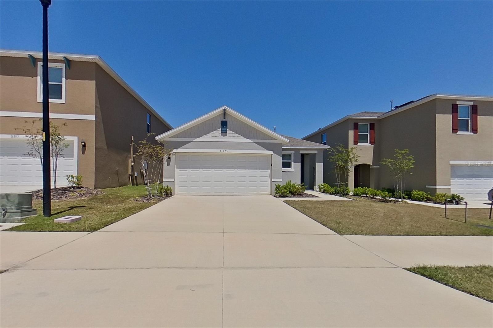 Welcome to Lake Griffin Reserve! This brand new single-family home in Leesburg offers 3 beds, 2 baths, a modern open floor plan, primary suite, granite countertops, fenced-in backyard, and two-car garage. A monthly $115 amenity fee includes lawncare. The neighborhood is located just 6 minutes from downtown Leesburg restaurants and 15 minutes from Lake Griffin State Park. Kairos Living is cat and dog friendly and is happy to provide long-term leases and 24/7 Emergency Maintenance! Please see last photo in reel for all applicable DISCLAIMERS. Visit our Kairos Living website to tour this home on your schedule with our "Self Tour" feature and apply today!
Please Note: The advertised rent amount covers the base rent only. Additional monthly charges include a $115.00 Amenity Fee (Smart Home and Lawn Care) and a $9.99 Utility Management Fee. Other charges, such as pet rent, may apply depending on your specific needs.