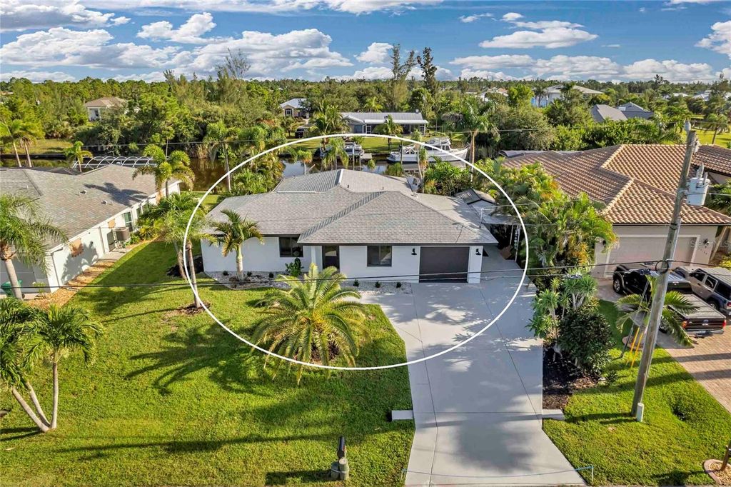 Photo of 15180 Lyneburg Avenue, Port Charlotte, FL 33981 (MLS # D6144360)