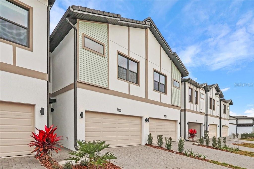 Photo of 10525 Ebb Tide Lane, Orlando, FL 32821 (MLS # O6368792)