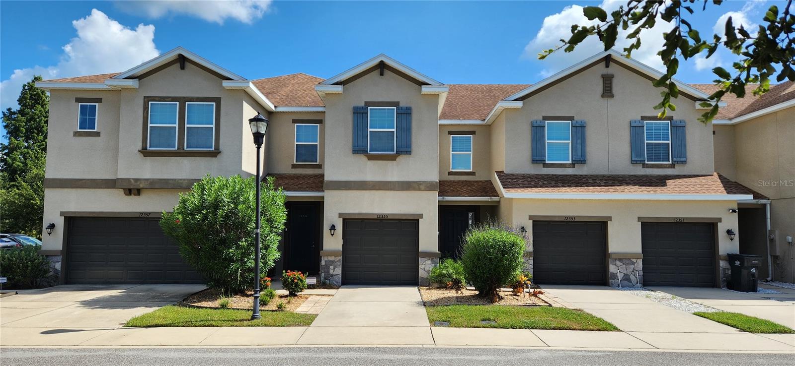 Welcome to easy living in the gated, maintenance-free community of Jackson Square Townhomes! This beautifully 3-bedroom, 2.5-bath townhome offers over 1,800 square feet of well-designed space, complete with a 1-car garage and an extended covered lanai overlooking a peaceful pond and citrus trees. Inside, you’re greeted by high ceilings and an open floor plan perfect for both entertaining and relaxing. The gourmet kitchen features 42" Tahoe Maple Espresso cabinetry, Caledonia granite countertops, Whirlpool stainless steel appliances, and a large island that anchors the spacious living and dining areas. A walk-in pantry adds functionality, while tile flooring on the main level adds style and durability. Upstairs, the Owner’s Suite is a true retreat with a walk-in closet, dual vanities, walk-in shower, pond view, and private water closet. Two additional bedrooms boast generous closet space and share a full bath. A flexible loft area and an upstairs laundry room add to the home’s convenience. The property is located in a small, quiet community with no CDD fees and flood insurance included in the HOA—a rare and valuable bonus. Enjoy proximity to Upper Tampa Bay Park, where you can kayak, paddleboard, or hike, and you’re just 10 minutes to Westchase, 15 minutes to Tampa International Airport, Tampa Bay, Tampa Bay Downs Golf Practice Facility, and 35 minutes to MacDill AFB. With only one set of owners who have taken cared for this home, it’s truly a great opportunity. If you’re seeking a balance of nature, location, and low-maintenance living, this is it. Don’t miss your chance to own in one of Tampa’s best-kept secrets—schedule your private showing today as seller understand the value of working with Realtors!