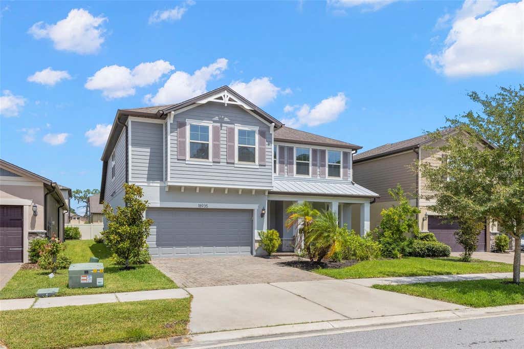 Photo of 18935 Birchwood Groves Drive, Lutz, FL 33558 (MLS # O6427663)