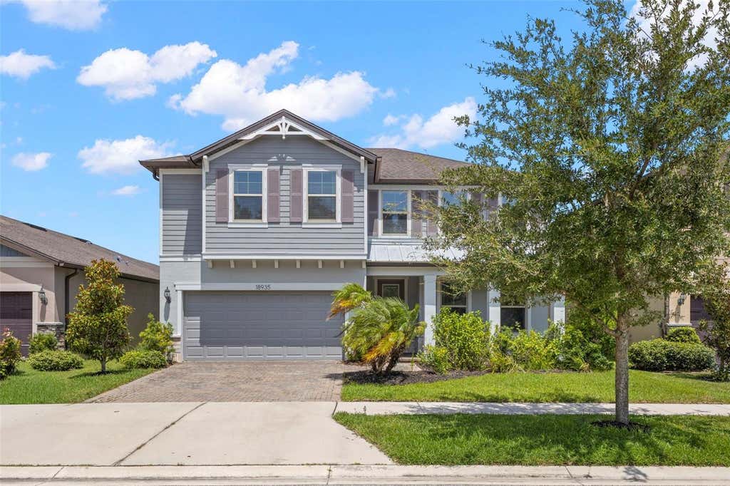 Photo of 18935 Birchwood Groves Drive, Lutz, FL 33558 (MLS # O6427663)