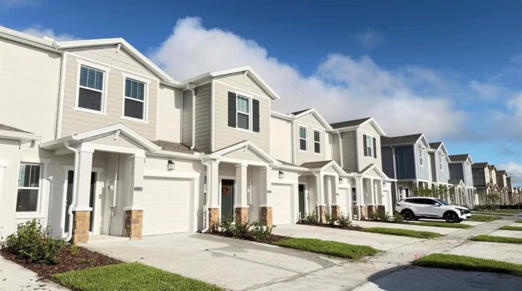 Photo of 3228 Namaste Drive, Clermont, FL 34714 (MLS # S5156912)