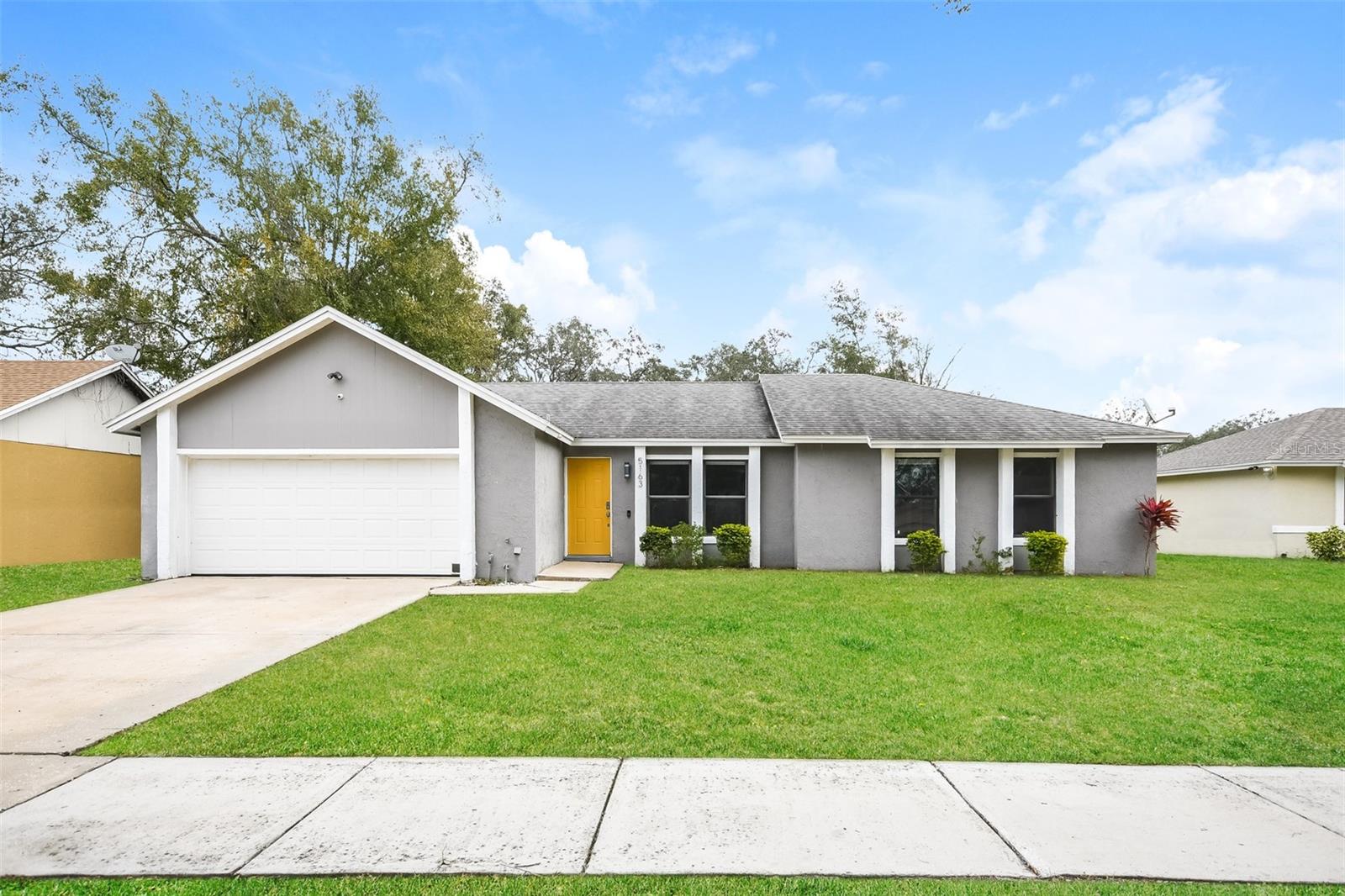 Discover the perfect blend of style and comfort in this stunning home nestled in the highly sought-after Oak Village neighborhood with NO HOA! This 3 bedroom, 2 bath home + extra bedroom (office space) was RECENTLY UPDATED throughout! The kitchen has beautiful sleek granite countertops, white modern cabinets and all stainless steel appliances. The heart of this home is its welcoming living area, complete with a charming wood-burning fireplace. It's the perfect spot for cozy evenings and cherished family moments. Both bathroom were completely remodeled and the home has laminate floors throughout. Step outside to the screened enclosed patio and HUGE FENCED backyard! Its just the perfect home for entertaining. Located just down the street from a delightful community park, this home is perfectly positioned. You’re only moments away from the best shopping, dining, and entertainment options the area has to offer. Schedule your private showing today!