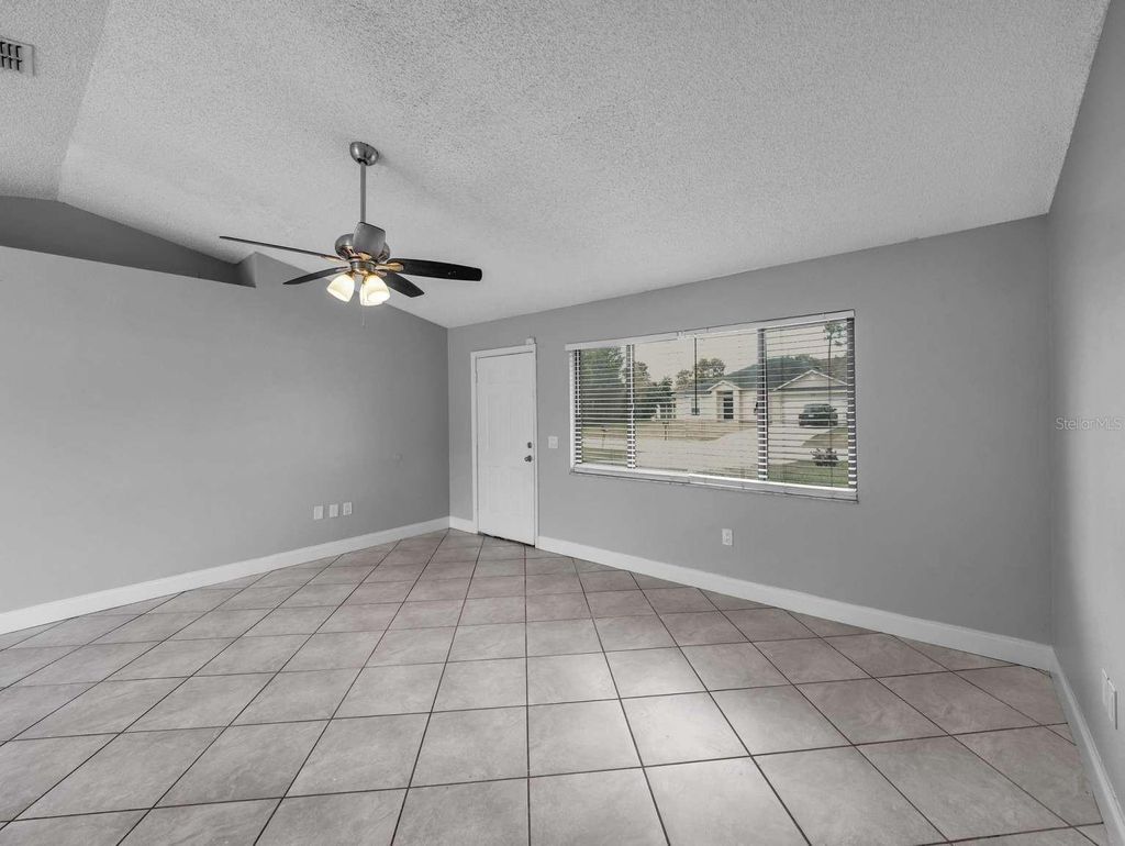 Photo of 1756 Gatewood Drive, Deltona, FL 32738 (MLS # TB8462675)