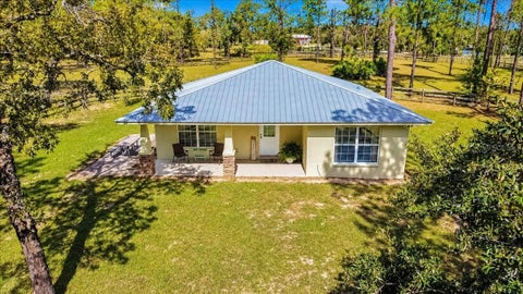 Photo of 12931 SE 21st Place, Morriston, FL 32668 (MLS # GC544296)