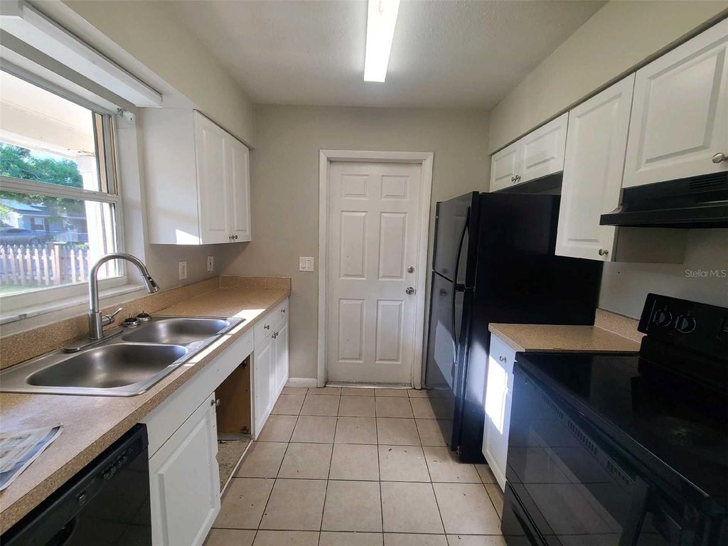 Photo of 3217 Deerfield Drive, Tampa, FL 33619 (MLS # O6315362)