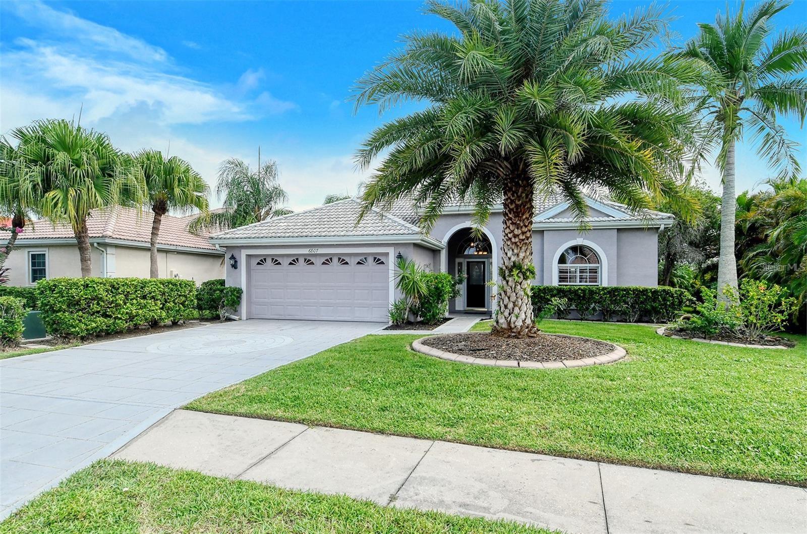 Your Slice of Paradise Awaits in this Spacious 3 bedroom/2 bath split plan home with a beautiful water view, high ceilings, crown molding and updates throughout! Newer Dishwasher and Microwave. Newer HVAC system, hot water heater, and pool pump; travertine and Newer vinyl plank flooring throughout! Gourmet kitchen with newer cabinets, soft close drawers and pullouts, granite counter tops with complimentary back splash. Great room/family room opens out to the pool with a full water view and extended lanai space perfect for entertaining! The spacious Master suite features a walk-in closet and an updated bathroom with dual sinks, separate tiled shower and tub! Mote Ranch Chaparral community amenities include: walking trails, playground, community pool, dock/fishing pier and kayak/canoe launch with access to the Braden River. Living in Mote Ranch means you enjoy great school districts, close proximity to Lakewood Ranch downtown with restaurants, shopping, and movie theatre as well as awesome parks all within biking distance, easy access to grocery stores, I-75, UTC Mall, Nathan Benderson Park, and don't forget the beautiful beaches like #1 rated Siesta Key and Anna Maria Island. Why Wait - Call now to Book your Tropical Paradise!