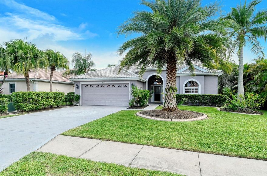 Your Slice of Paradise Awaits in this Spacious 3 bedroom/2 bath split plan home with a beautiful water view, high ceilings, crown molding and updates throughout! Newer Dishwasher and Microwave. Newer HVAC system, hot water heater, and pool pump; travertine and Newer vinyl plank flooring throughout! Gourmet kitchen with newer cabinets, soft close drawers and pullouts, granite counter tops with complimentary back splash. Great room/family room opens out to the pool with a full water view and extended lanai space perfect for entertaining! The spacious Master suite features a walk-in closet and an updated bathroom with dual sinks, separate tiled shower and tub! Mote Ranch Chaparral community amenities include: walking trails, playground, community pool, dock/fishing pier and kayak/canoe launch with access to the Braden River. Living in Mote Ranch means you enjoy great school districts, close proximity to Lakewood Ranch downtown with restaurants, shopping, and movie theatre as well as awesome parks all within biking distance, easy access to grocery stores, I-75, UTC Mall, Nathan Benderson Park, and don't forget the beautiful beaches like #1 rated Siesta Key and Anna Maria Island. Why Wait - Call now to Book your Tropical Paradise!