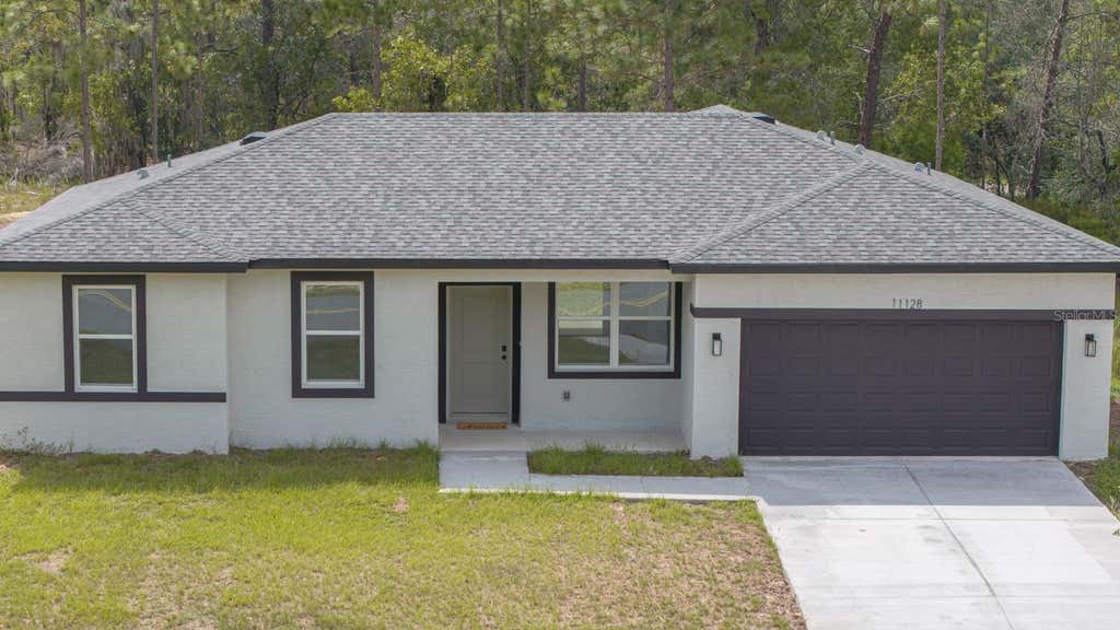 Photo of 11128 N G Martinelli Blvd, Citrus Springs, FL 34433 (MLS # TB8542895)
