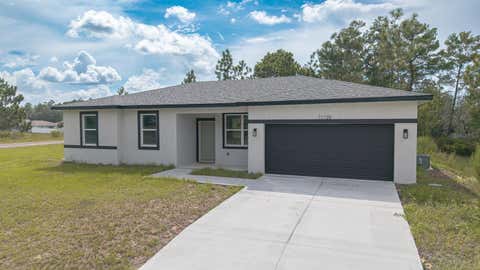 Photo of 11128 N G Martinelli Blvd, Citrus Springs, FL 34433 (MLS # TB8542895)