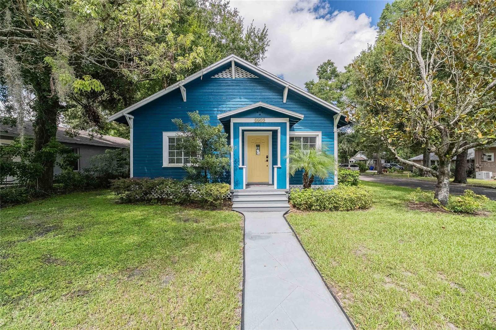 Historic Charm, Modern Comfort – 1915 Downtown Dixieland Treasure
Experience the best of past and present in this beautifully preserved 1915 home, perfectly located on a corner lot in Lakeland’s sought-after Dixieland Historic District—just minutes from the vibrant heart of downtown.
Currently a thriving Airbnb, this 3-bedroom, 2-bath gem blends original character with thoughtful updates, offering both timeless appeal and income-generating potential.
Inside, a welcoming living room with a cozy fireplace invites you to unwind, while the formal dining room sets the stage for memorable gatherings. The updated kitchen shines with rich wood cabinetry, granite countertops, and generous prep space for the home chef.
The primary suite is a serene retreat with a walk-in closet and a spa-inspired ensuite featuring a tiled walk-in shower and dual vanities. Two additional bedrooms and an updated guest bath offer comfort for family or visitors.
Step outside to enjoy the gated backyard, concrete parking pad, and alley access—perfect for both everyday convenience and entertaining.
With restaurants, shops, and cultural attractions just steps away, this home offers the rare opportunity to enjoy downtown living while savoring the elegance of a property that has truly stood the test of time. Whether you’re searching for a personal residence, vacation escape, or turnkey investment, this one delivers.