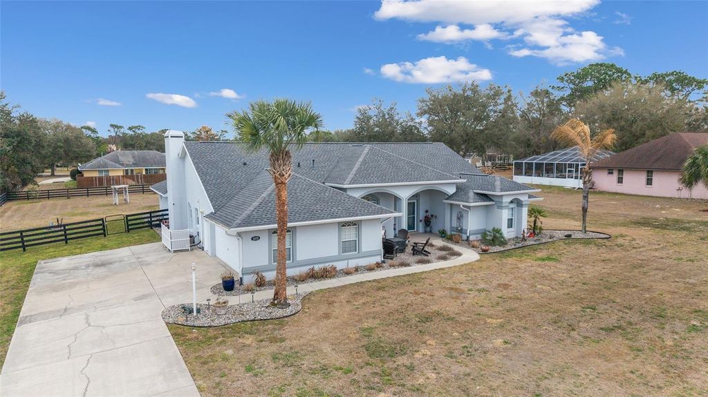 Photo of 5970 NE 57th Loop, Silver Springs, FL 34488 (MLS # OM719683)