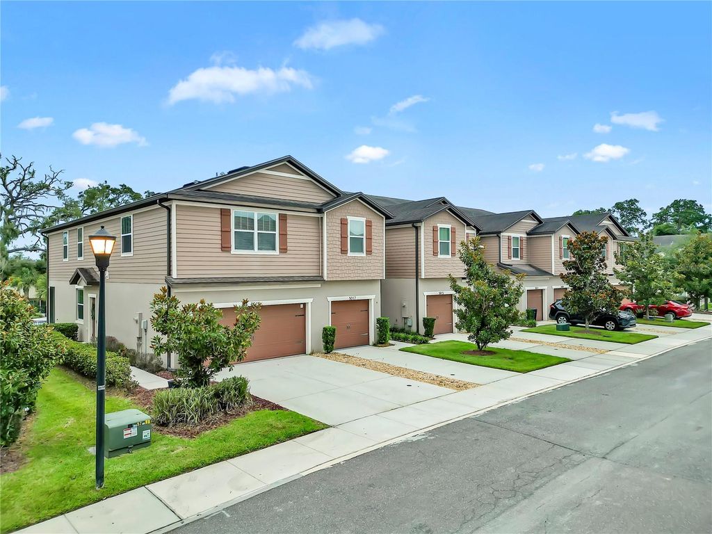 Photo of 5019 Blue Latan Lane, Tampa, FL 33610 (MLS # TB8533020)