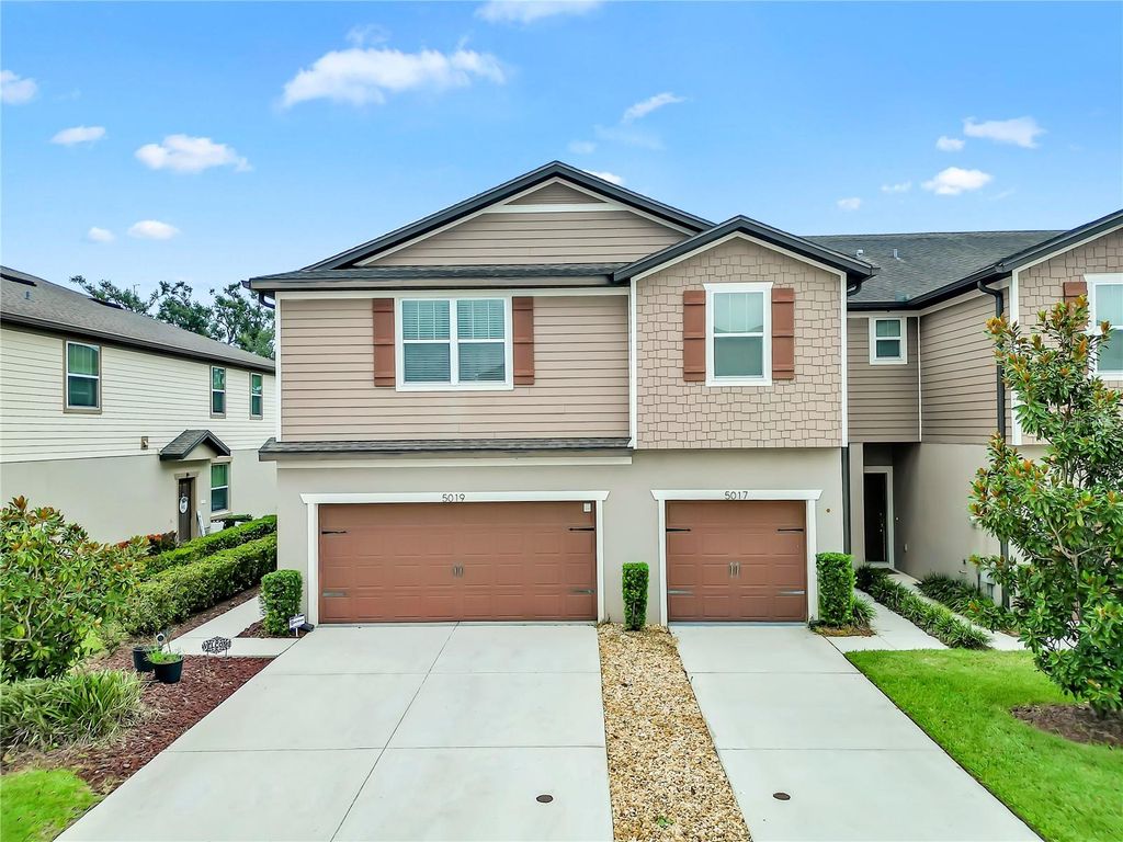 Photo of 5019 Blue Latan Lane, Tampa, FL 33610 (MLS # TB8533020)
