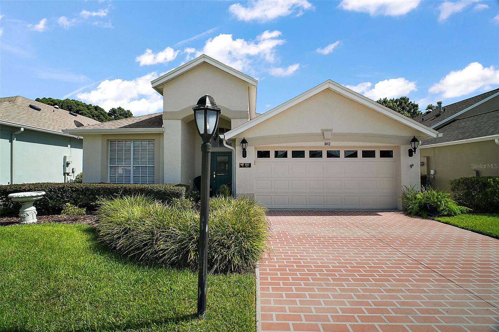 Welcome to your new home in the highly sought-after Country Club of Mount Dora! This inviting 3-bedroom, 2-bath residence offers the perfect blend of comfort and convenience, featuring a private backyard with no rear neighbors, a spacious 22x8 lanai, and ideal north-facing exposure. The primary suite boasts an en-suite bath with a soaking tub, separate shower, and dual sinks, while solar tubes fill the home with natural light. Enjoy peace of mind with a newer roof (2019) and a transferrable termite bond. As a resident of CCMD, you’ll have the option to join the social membership for access to the community pool, tennis, pickleball, and special events—or upgrade to a full golf membership for year-round play. Just minutes from charming downtown Mount Dora’s shopping and dining, with quick access to the 429 for easy trips to Orlando International Airport and world-class attractions, this home truly has it all!
