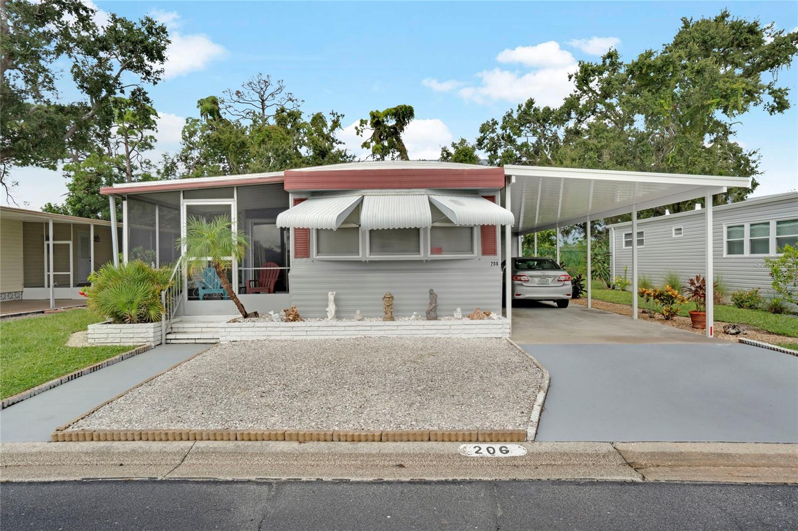 **THE DEAL OF A LIFETIME!**
You're staring at the most incredible opportunity to own a stunning 2/2 manufactured home in the gated community of Oakwood Manor that's truly one-of-a-kind!
This isn't just any home - it's a brand-new carport (2025), a shiny new garbage disposal (2025), and a new (2025) state-of-the-art central A/C heat pump system that'll keep you cool and comfortable all year round.
And the community? It's a resort-like oasis with a heated pool, spa, and shuffleboard courts, perfect for active adults who love to stay engaged and social. Plus, with an on-site manager and lawncare included, you'll have peace of mind knowing that the park is immaculate.
But that's not all - this community is the **only** manufactured home park in the city of Sarasota, making it a truly unique find. And with a low monthly HOA fee of just $190, you'll be able to enjoy all the amenities without breaking the bank. Here you can enjoy a serene and secluded living experience.
**BUT WAIT, THERE'S MORE!**
* No motorcycles allowed, so you can enjoy a peaceful and quiet living environment
* Active 55+ community, perfect for individuals who love to stay engaged and social
* Gated community for added security and peace of mind
**DON'T LET THIS OPPORTUNITY SLIP AWAY!**
Contact your favorite Realtor today to schedule a viewing and make this incredible home yours!
