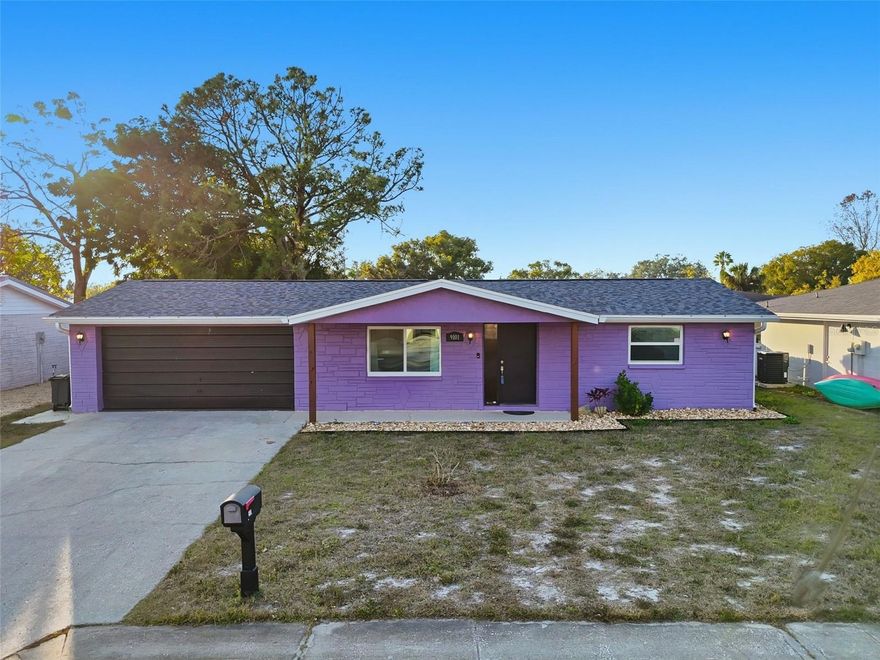 Welcome to 9101 Hunt Club Ln, a well-maintained 2/1/2 with an office/den, with Recent updates and convenient access to everyday amenities. The exterior has been freshly painted in a bold, modern purple, giving the home unique curb appeal. Major improvements include a new roof (2024) and new windows (2021), newer ac, providing peace of mind for years to come. Inside, you’ll find a remodeled kitchen and bathroom, offering updated finishes and functionality. The property features a fully fenced yard, perfect for pets, privacy, or outdoor entertaining, and is situated on a quiet street while still being close to US-19 for easy commuting, shopping, and dining. A great opportunity for an investment property or buyers seeking a move-in-ready home with character and solid upgrades and a little TLC. NO HOA or CDD