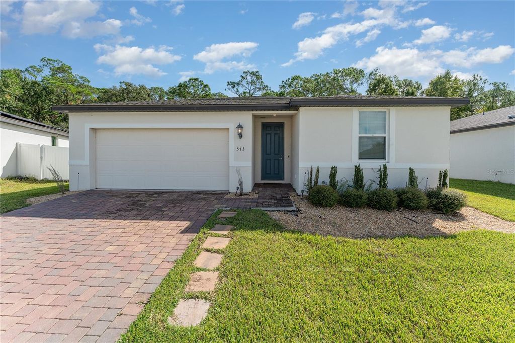 Photo of 573 Vista Villages Boulevard, Davenport, FL 33896 (MLS # TB8513536)