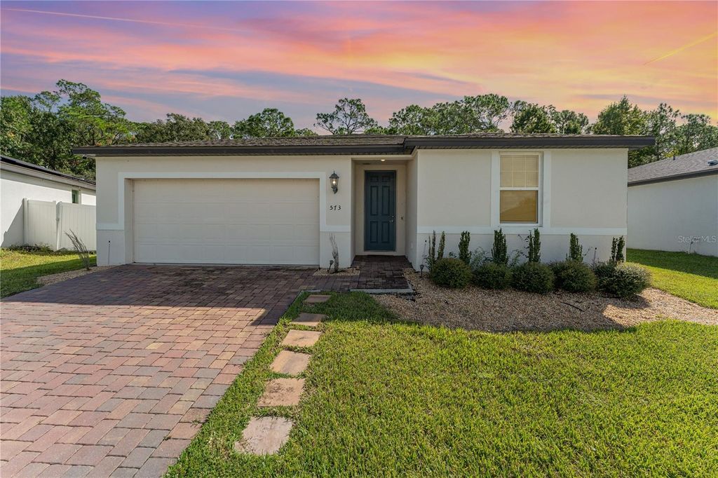 Photo of 573 Vista Villages Boulevard, Davenport, FL 33896 (MLS # TB8513536)