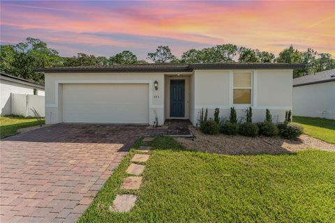 Photo of 573 Vista Villages Boulevard, Davenport, FL 33896 (MLS # TB8513536)