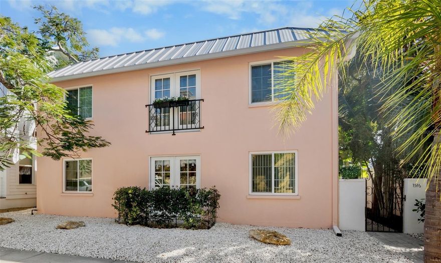 In the heart of desirable Burns Court in Sarasota, stands a captivating European-inspired Florida home. 1516 Oak Street offers the unique advantage of downtown walkability coupled with the privacy of a fully fenced, meticulously landscaped yard adorned with native plants. This residence provides an ideal alternative to condominium living, granting residents exclusive private outdoor space for themselves and their pets without the financial burden of monthly condominium fees.

Indulge in the sun on the expansive upstairs balcony or unwind on the shaded patio. Prepare delectable charcuterie boards in the well-appointed kitchen, perfect for hosting happy hour gatherings, dinner parties, garden parties, or brunches. Each restful bedroom is equipped with an ensuite bathroom, ensuring privacy and convenience.

Situated conveniently near the Saturday Farmers Market, a variety of local restaurants, and the Sarasota Bayfront, this exceptional property offers unparalleled potential. Currently arranged as a fully furnished duplex, it also presents remarkable versatility as a family compound, an income-generating investment, or a potential conversion into a spacious single-family home.

The owner has invested significantly in high-quality upgrades to ensure the home’s move-in readiness, including:

- A new metal roof installed in 2022
- A replaced sewer line and relined pipes in 2023
- New windows, updated electrical systems, and a new air conditioning unit completed in 2025
- A well for irrigation to maintain the lush landscaping
- Natural gas connection
- Off street parking for 4 cars and a storage shed
- Completely fenced yard and landscape lighting.

  Furthermore, due to the property’s DTE zoning, there is potential to add another structure on the site, expanding the possibilities for future development.

Experience a remarkable lifestyle in Burns Court. Schedule a private tour today.