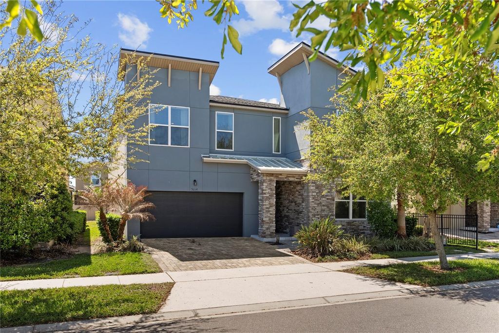 Photo of 9014 Pelican Cove Trail, Kissimmee, FL 34747 (MLS # O6399359)