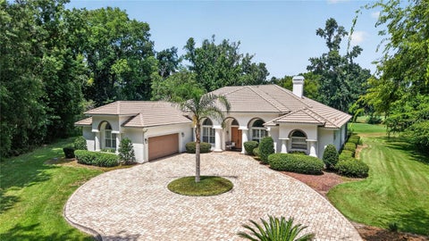 Photo of 7759 SE 12th Circle, Ocala, FL 34480 (MLS # OM728589)
