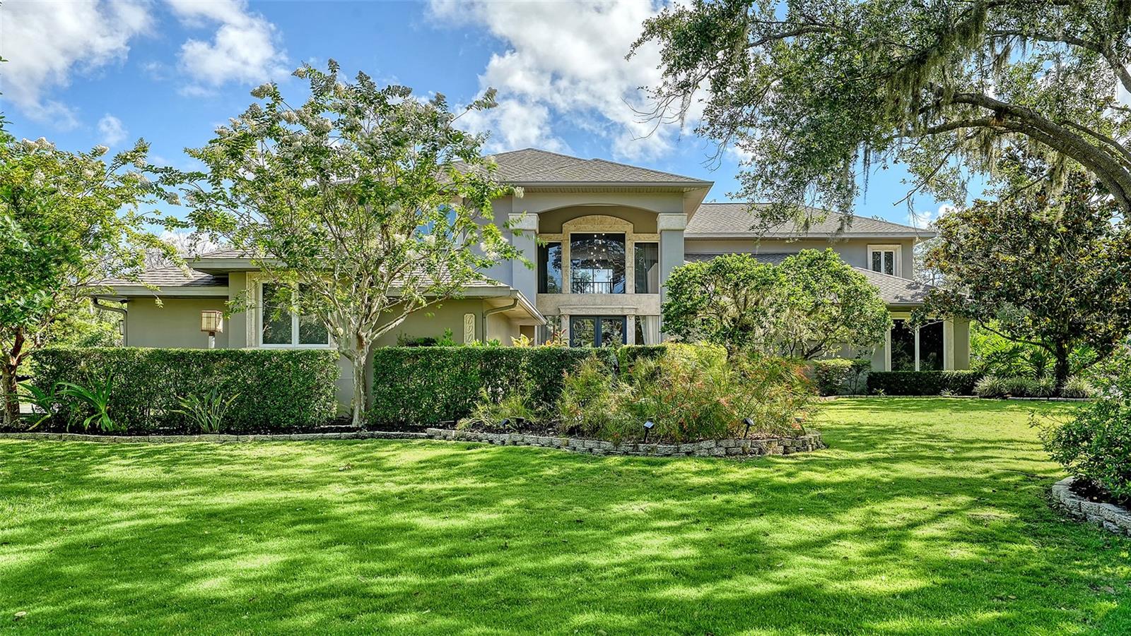 Unique, first time on the market home with private lot – 1.34 acres. Located in River Club (no CDD), this home is just waiting for its next owner to make it theirs. Home was custom built with over 4,0000 sq ft, 4 bedrooms, 3 ½ half baths, large great room, office, dining room, bonus room, storage room, 3 car garage and large lanai with pool. The upstairs master bedroom retreat has two walk-in closets with built-ins and private deck that was stained and rescreened in 2023. Large Master bathroom with lime stone flooring and two new sinks. Also, upstairs is a bonus room with Brizan Hickory Engineered Hardwood flooring and large storage room. Downstairs there are three other bedrooms. Bedroom two and three has a Jack-n-Jill bathroom, Bedroom four has an en-suite bathroom. All three bedrooms downstairs have new ceiling fans. Kitchen offers travertine flooring, Newer Stainless-Steel appliances, granite counter tops, double oven, and island with range. Great room has Brizan Hickory Engineered Hardwood flooring, wood burning fireplace, and wet bar with newer refrigerator. Laundry room comes with LG washer/dryer, sink and plenty of cabinets and closet. House also offers central vacuum, on demand whole house hot water, hook-up in garage for gas generator, and large lanai with salt water pool that was rescreened in 2023. Ages: water heater 2020, one 3-ton 15 seer AC 6/2024, two 2-ton 14 seer ACs 12/2019, and roof 4/2019.