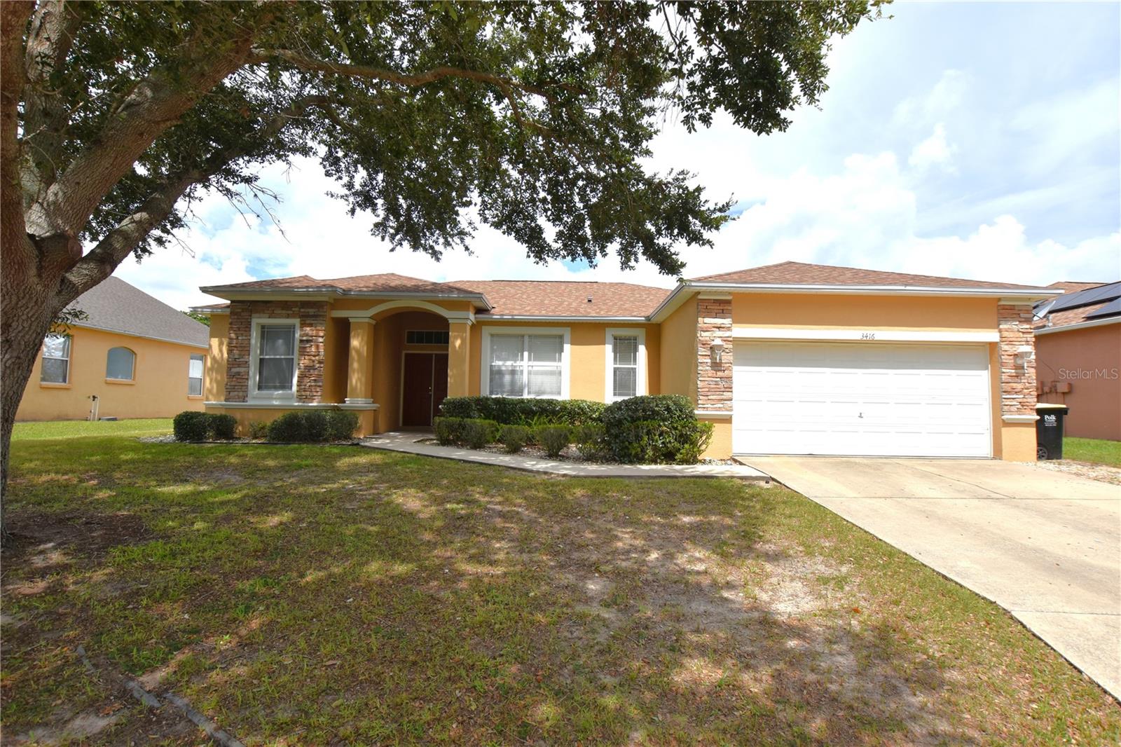 One or more photo(s) has been virtually staged. Check out this 4 bedroom 2 bath in the Clubhouse Heritage community. This home boasts an open floor plan, formal dining room and living room. Open kitchen with breakfast bar and breakfast nook. Large living room. NEW Tile floors throughout the living spaces with carpeting in bedrooms. Large master bedroom with private ensuite that offers dual sink vanity with step in shower and separate tub. As well as a large walk in closet. Inside laundry room with washer and dryer connections. 2 car garage with opener. Large back yard. Great location with easy access to Polk Parkway.